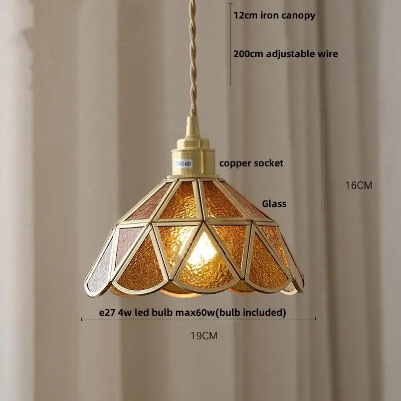 Vintage teal blue glass led pendant light with warm-toned geometric design and brass metal framing for kitchen decorbites blue glass decor