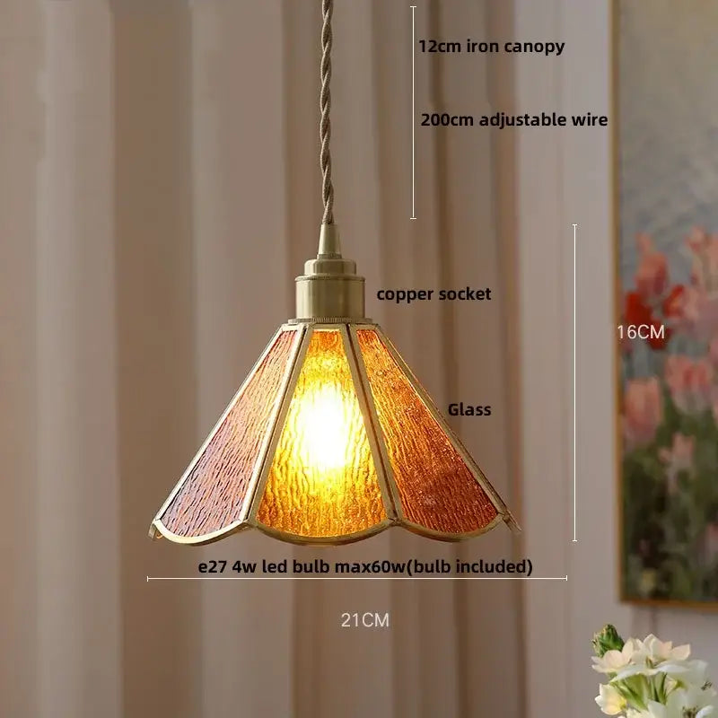 A warm amber-toned stained glass pendant light with copper socket and iron canopy for decorbites blue glass led lighting