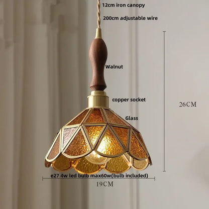 Warm amber-tinted stained glass pendant light with walnut-finished wooden handle and brass accents by decorbites led wood