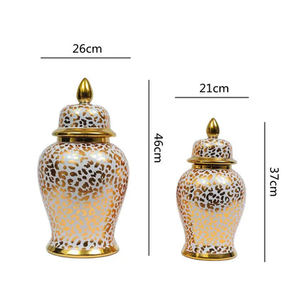 Two vintage white ceramic checkmate jars with gold leopard print and matching lids for living room decorbites decor