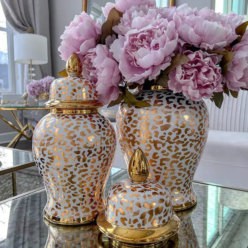 Vintage white ceramic checkmate jar decorbites leopard print with gold lids and pink peonies for living room decor