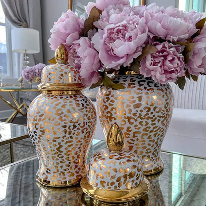 Vintage white ceramic checkmate jar decorbites leopard print with gold lids and pink peonies for living room decor