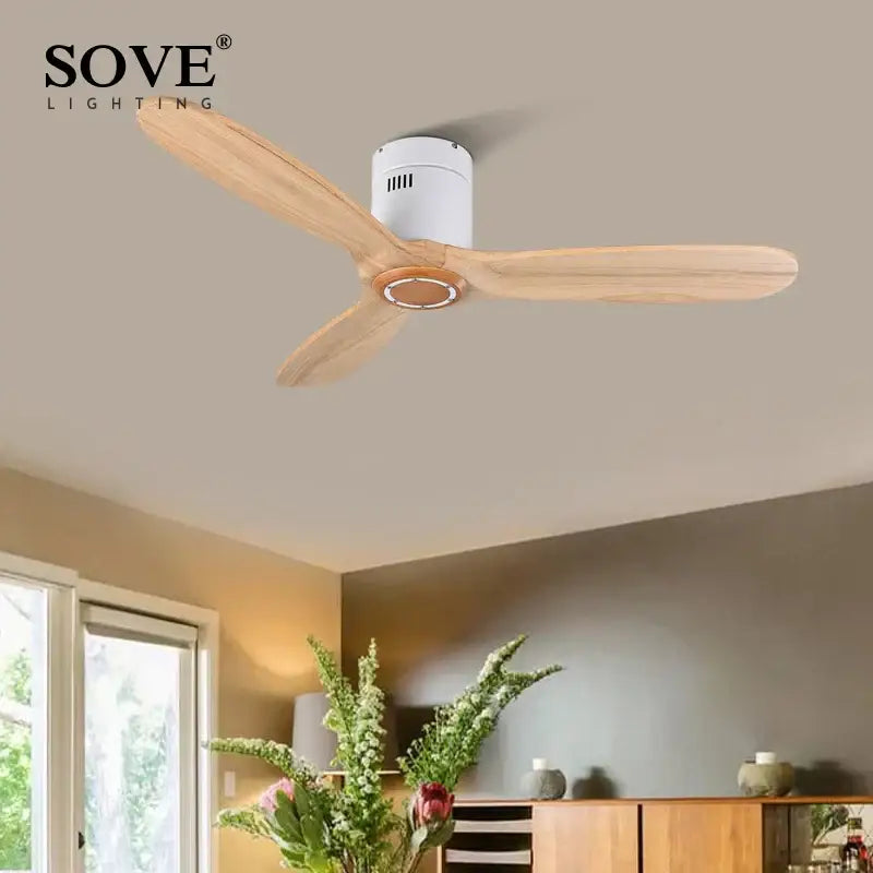 Vintage white and wood ceiling fan with light wood blades and white housing featuring remote control for bedroom use