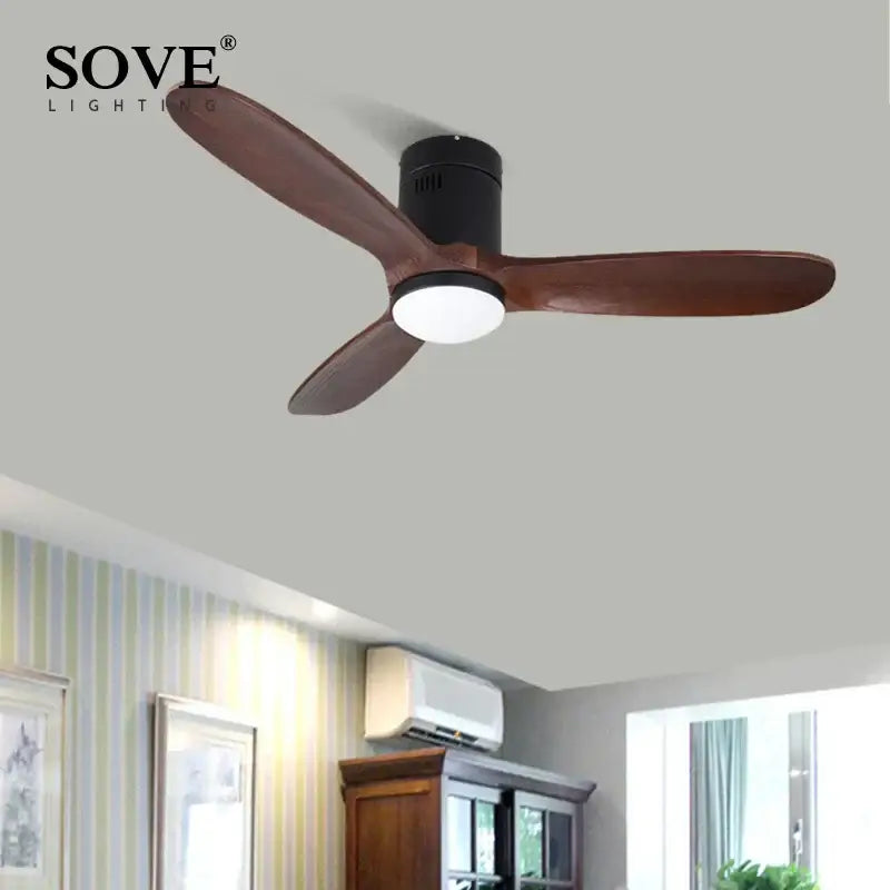 Vintage white and wood ceiling fan with remote control featuring three dark brown wooden blades and integrated light