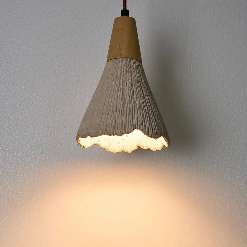 Vintage white cement led pendant lamp with natural wood top and textured body for dining room decorbites cement led