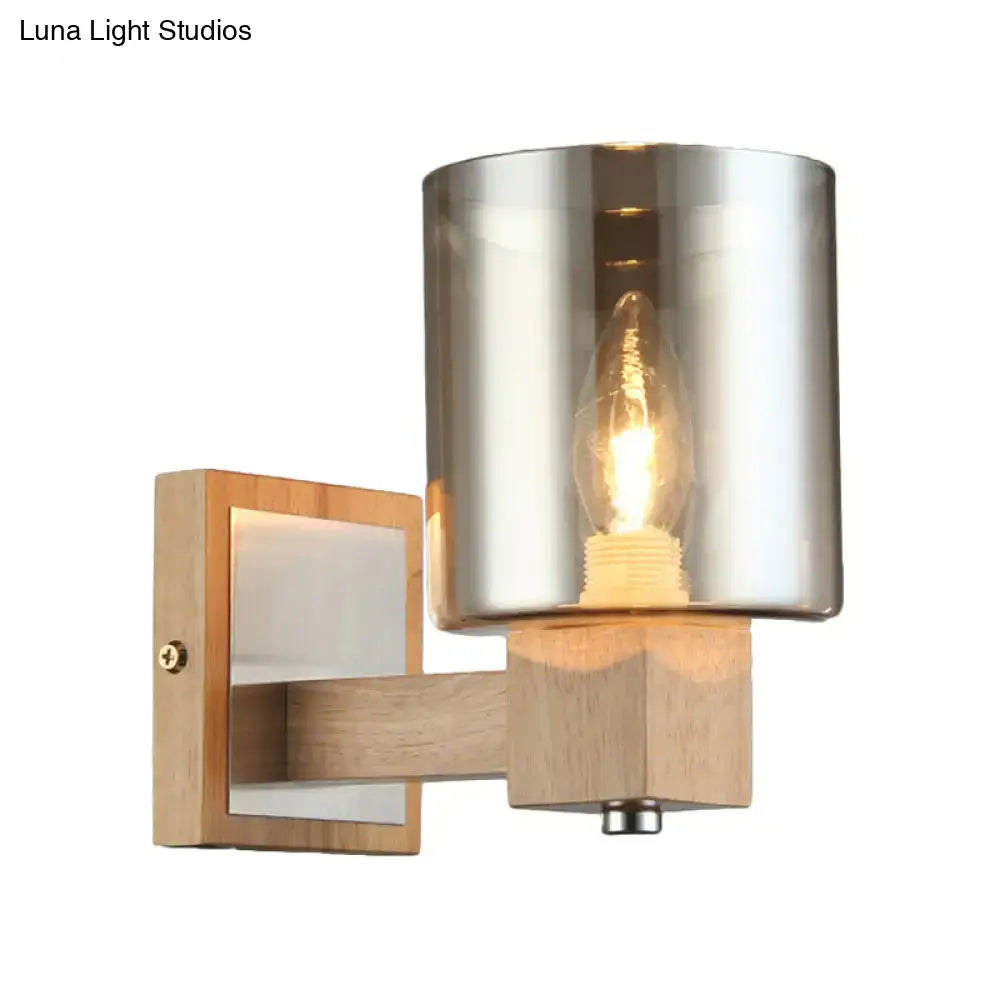 Modern wall lamp with brushed metal glass shade, wooden base, and wall mount for bedroom lighting