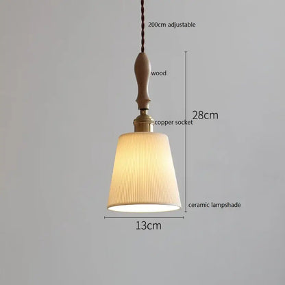 A warm-toned ceramic led pendant light with vertical pleats and rattan accents for dining room decorbites ceramic led