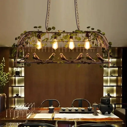 Bronze wrought iron bird cage chandelier with intricate bird and leaf decor featuring four edison bulbs for living room decorbites bird cage