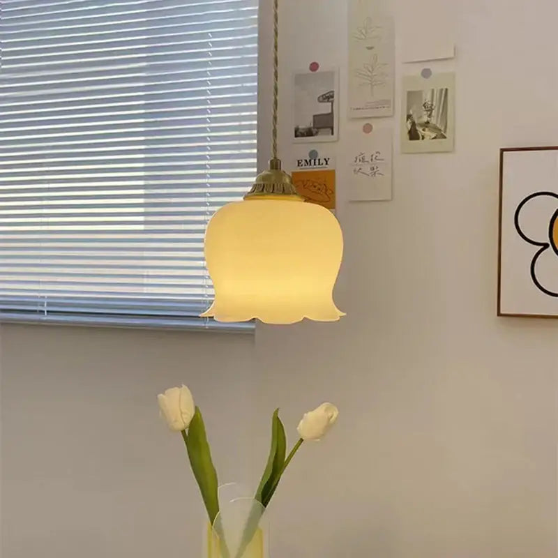 Warm softly glowing vintage yellow tulip pendant light with decorbites brass resin led fixture for dining room decor