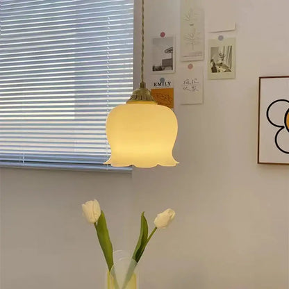Warm softly glowing vintage yellow tulip pendant light with decorbites brass resin led fixture for dining room decor