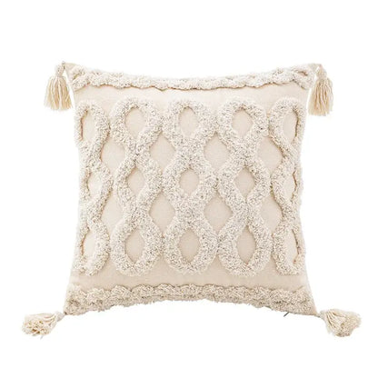 Cream-colored wabi-sabi beige geometric tufted cushion cover with woven diamond pattern and tassels for living room use