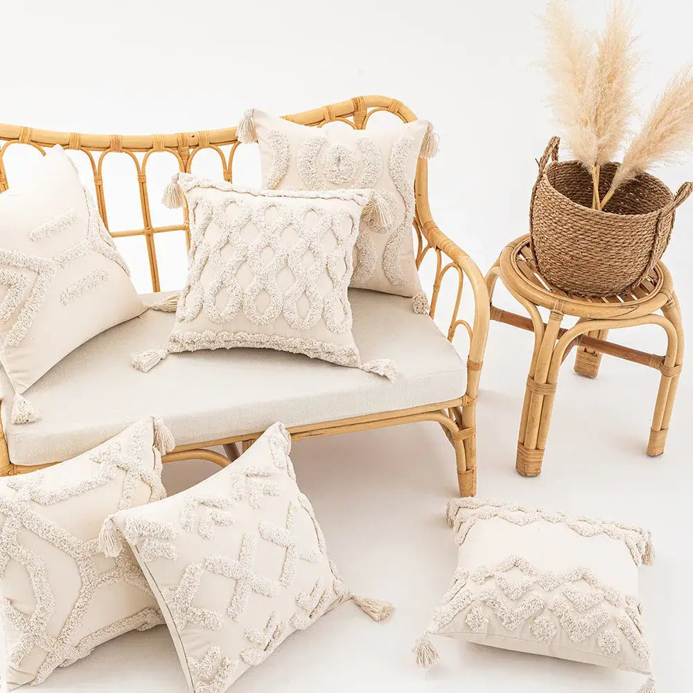 Cream-colored wabi-sabi beige geometric tufted cushion cover with textured embroidery and tassels for living room use