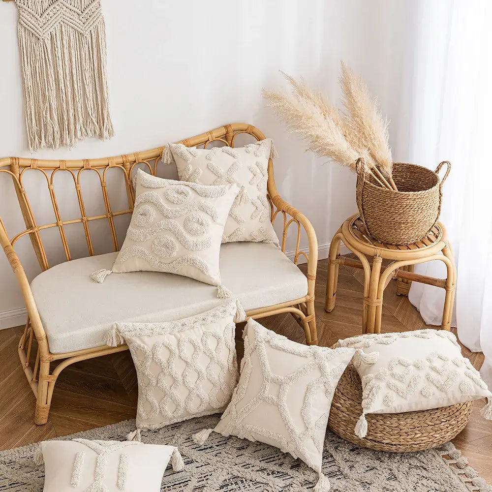 Cream-colored wabi-sabi tufted cushion cover with textured geometric patterns and tassels for living room decor