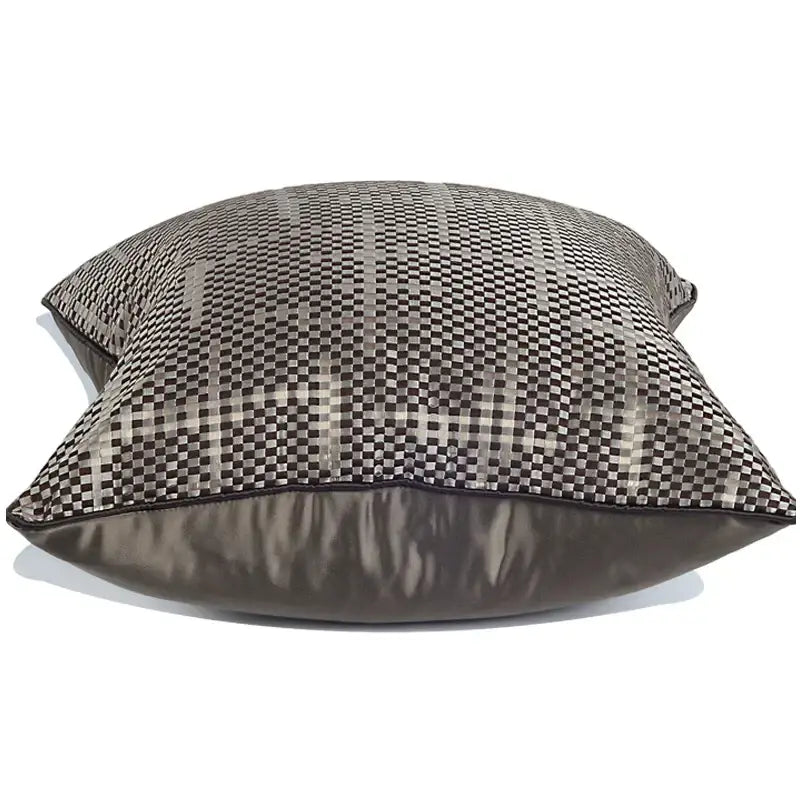 Wabi sabi black and silver geometric pillow cover with woven checkered pattern and dark gray leather trim decorbites brown geometric