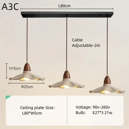 Modern three-light pendant light with cream ceramic shades and natural wood material for dining room lighting