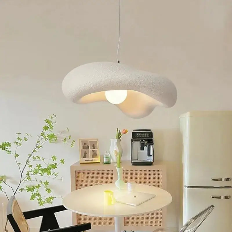 A soft off-white cloud shaped wabi sabi pendant light with textured surface led pendant light for bedroom hanging lamp
