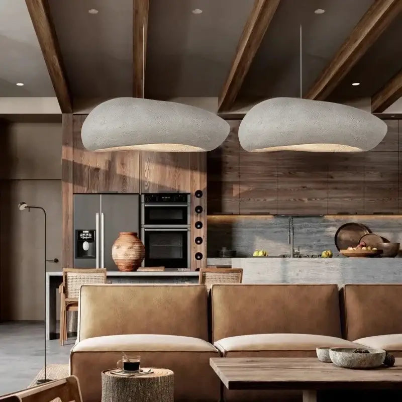 Two large cloud-shaped wabi sabi gray decorbites handmade polystyrene indoor pendant lights with textured concrete finish