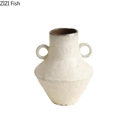 White ceramic decorbites ceramic vase with two circular handles and textured surface for rustic living room decor