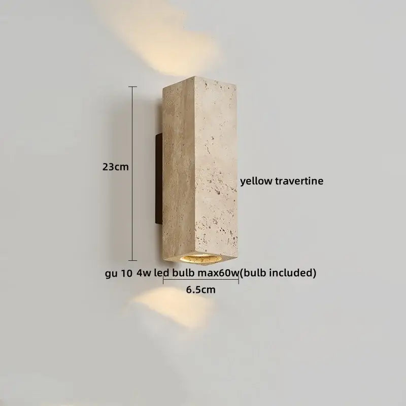 A rectangular yellow travertine wabi sabi terrazzo and wood led wall light with textured finish and warm base light for bedroom decorbites led wall lights
