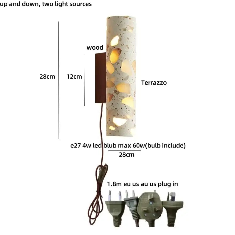 Wabi sabi terrazzo and wood led wall lights featuring a cylindrical light concrete body with warm led lighting