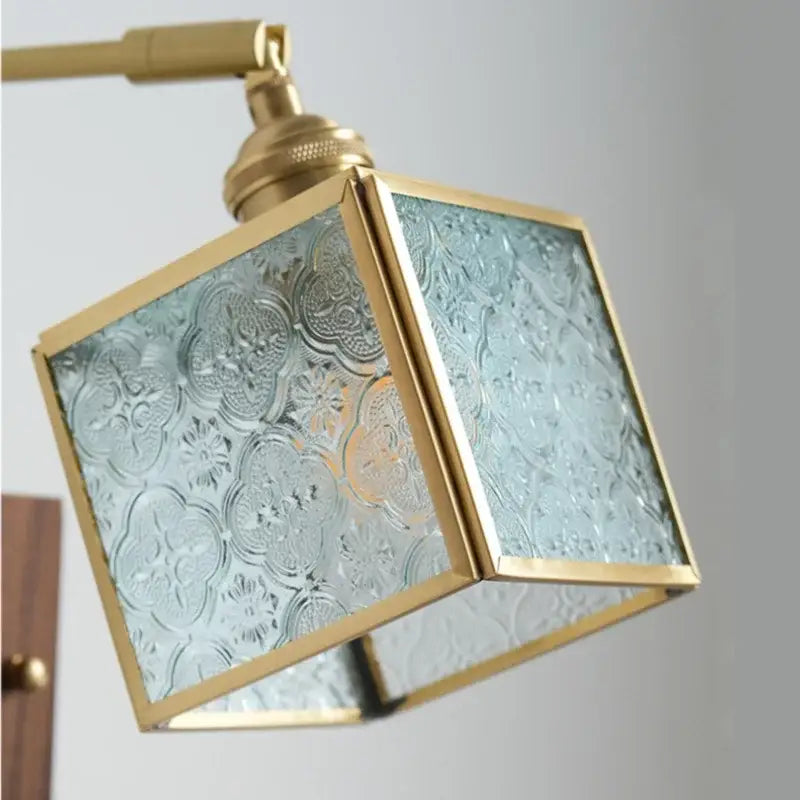 Walnut and brass cube glass led wall sconce with frosted floral embossed panels for bedroom mirror lighting decorbites cube glass