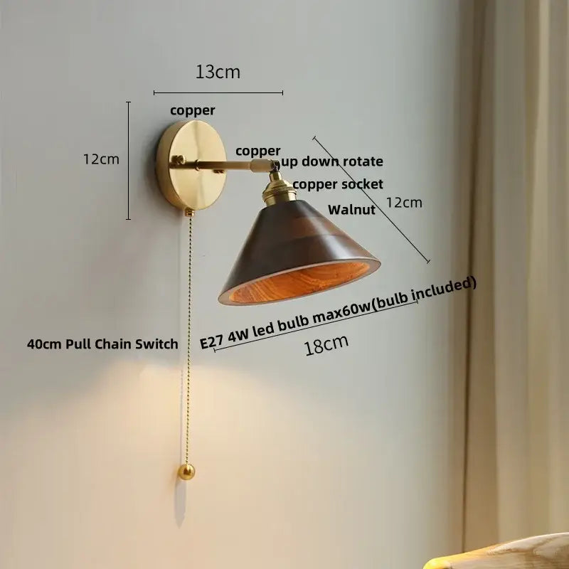 Walnut and brass wall sconce with copper finish, dark walnut shade, adjustable design, and pull chain switch for bedroom light