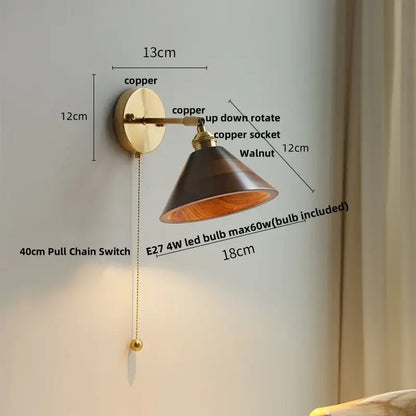 Walnut and brass wall sconce with copper finish, dark walnut shade, adjustable design, and pull chain switch for bedroom light