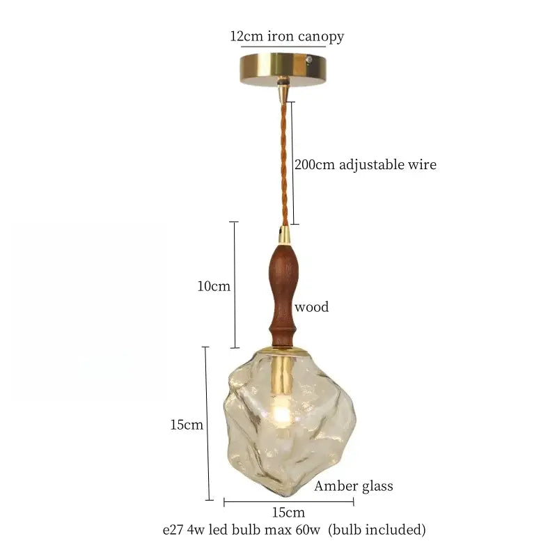 Warm brass cracked glass led pendant light with translucent amber glass wooden handle and brass accents for dining room decorbites cracked glass pendant light