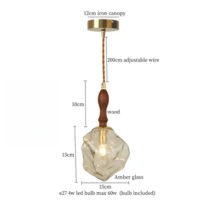 Warm brass cracked glass led pendant light with translucent amber glass wooden handle and brass accents for dining room decorbites cracked glass pendant light
