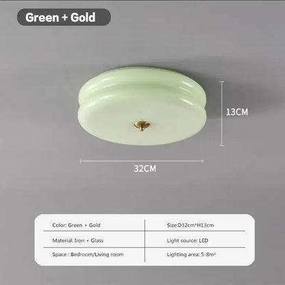 A sleek warm chrome double layer glass led ceiling light with pale green glass shade and gold iron fixture for bedroom