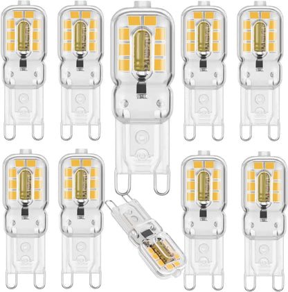 Clear glass DecorBites G9 LED bulb with warm white glow and metallic contacts for living room light decor
