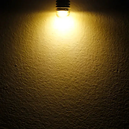 A warm white frosted decorbites g4 led bulb with frosted glass and metallic base for home lighting and bedrooms