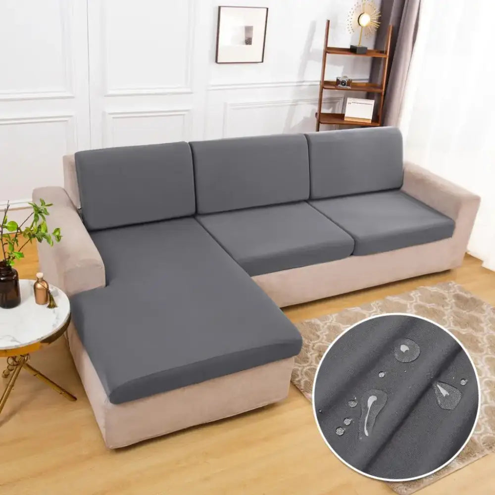 Waterproof gray elastic sofa cushion cover made of stretchy fabric protecting living room furniture