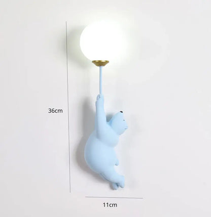 Light blue decorbites blue bear 3d moon wall lamp with spherical white bulb and gold-toned fixture for bedroom lighting