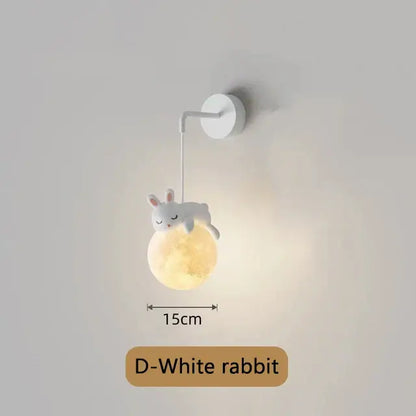 Whimsical blue pink and white bear wall lamp with glowing textured moon base and soft ambient lighting for kids bedroom