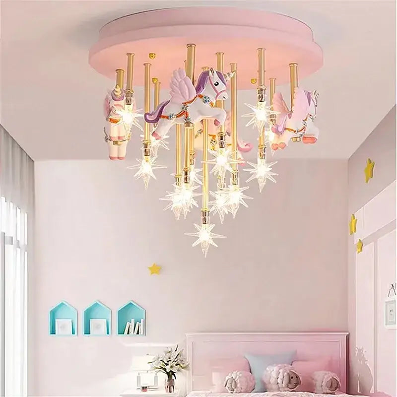 Pink ceiling light featuring golden poles with dangling unicorns and star-shaped fixtures for decorbites anime animal kids room