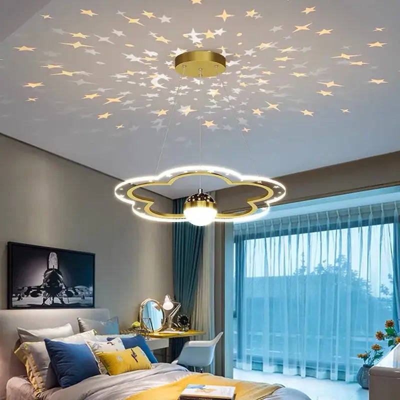 Whimsical pink and gold cloud flower led chandelier with glowing center and star projections for bedroom decorbites cloud flower
