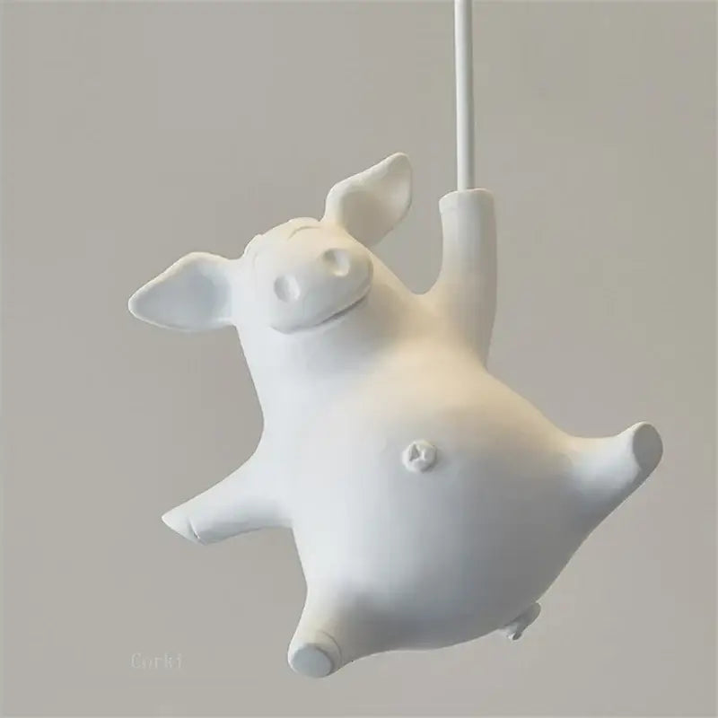 White ceramic pig-shaped flying pig resin led ceiling light with minimalist smooth glossy finish for bedroom