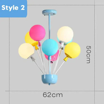 Whimsical wooden house balloon ceiling chandelier with pastel pink yellow teal shades and light blue base for nursery