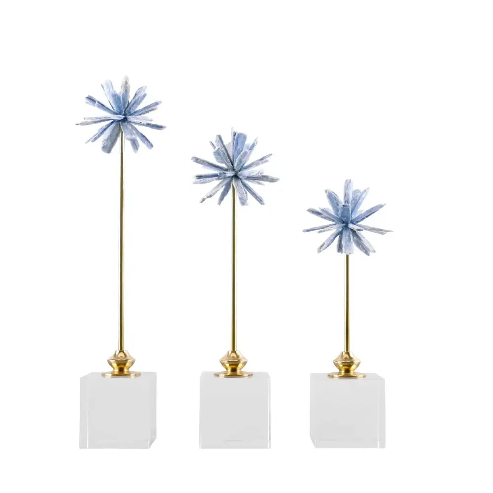Set of three blue crystal starburst home decor figurines on gold stems with clear acrylic bases for living room decor