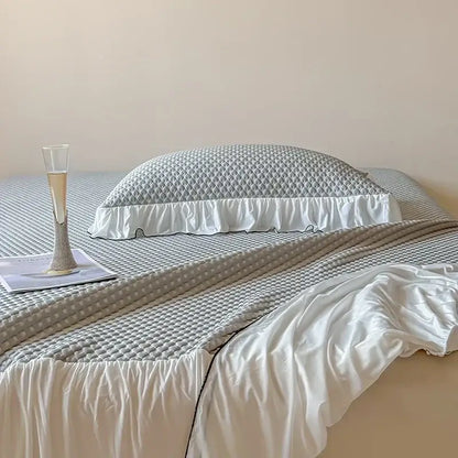 Gray quilted pillow sham with white ruffled edge in decorbites cool feeling bedding set for elegant bedroom decor