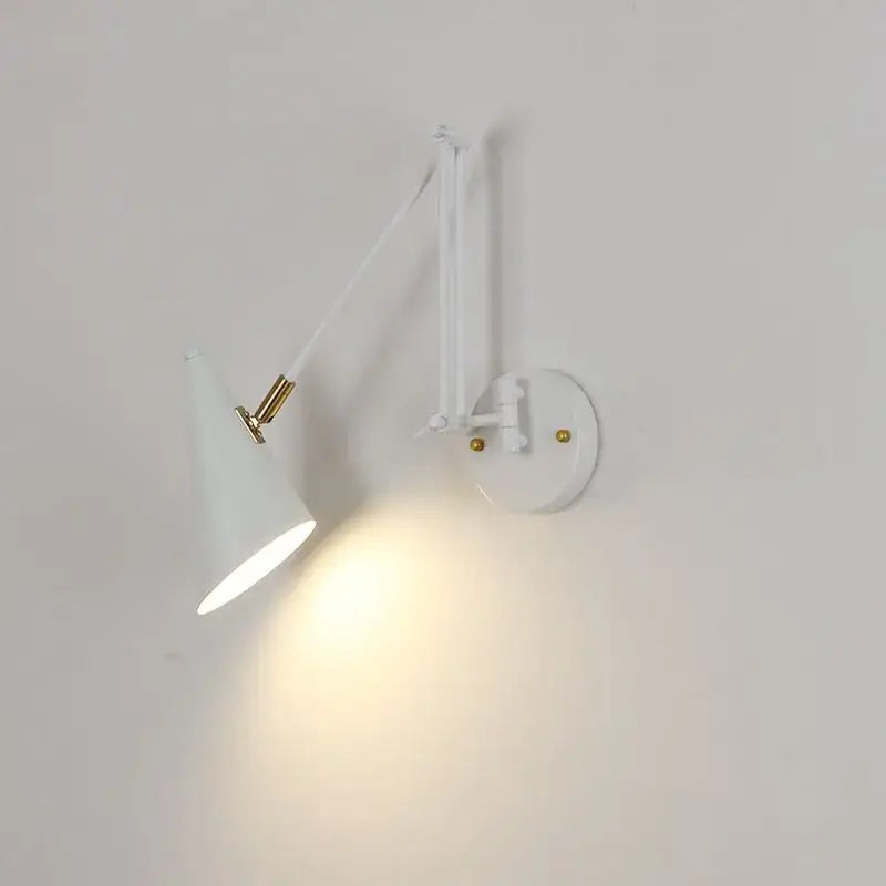 White adjustable wall lamp with gold-toned conical shade from decorbites astronaut wall sconces collection for bedroom