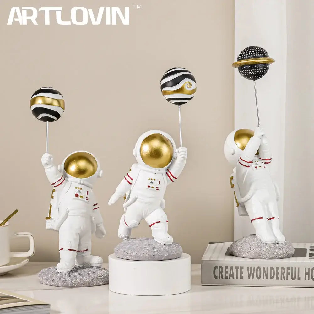 White and gold astronauts figurines with red-striped suits holding balloons on silver sticks for living room decorbites decor