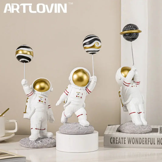 White and gold astronauts figurines with red-striped suits holding balloons on silver sticks for living room decorbites decor