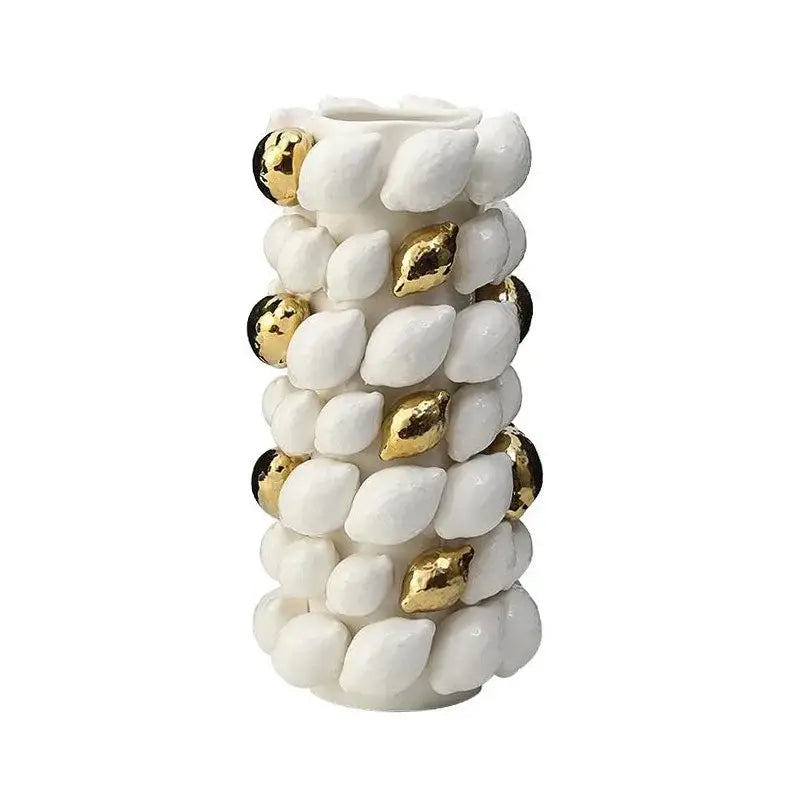 White and gold carambola ceramic vase with textured shell-like design and black and gold accents for living room decorbites lemon carambola