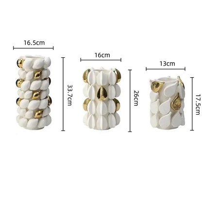 Three white and gold lemon carambola ceramic vases with varied sizes for elegant living room decorbites decor