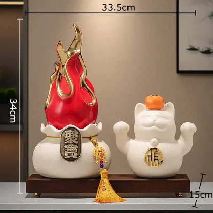 Red and gold flame-shaped ceramic feng shui ornament with chinese characters on white base for living room decor