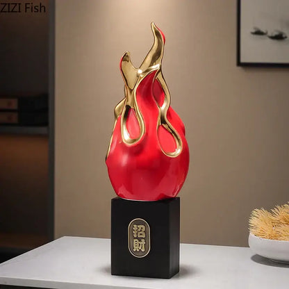 Red and gold flame-shaped decorative sculpture on black base with chinese characters feng shui ornament for living room decor