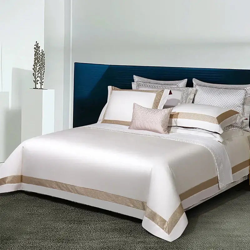 Elegant white satin egyptian cotton bedding set with gold embroidery geometric trim and matching pillowcases