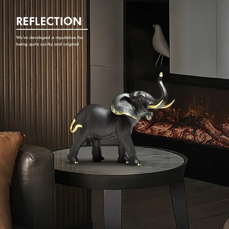 Black decorbites elephant resin sculpture with gold-trimmed ears tusks and tail for living room decor